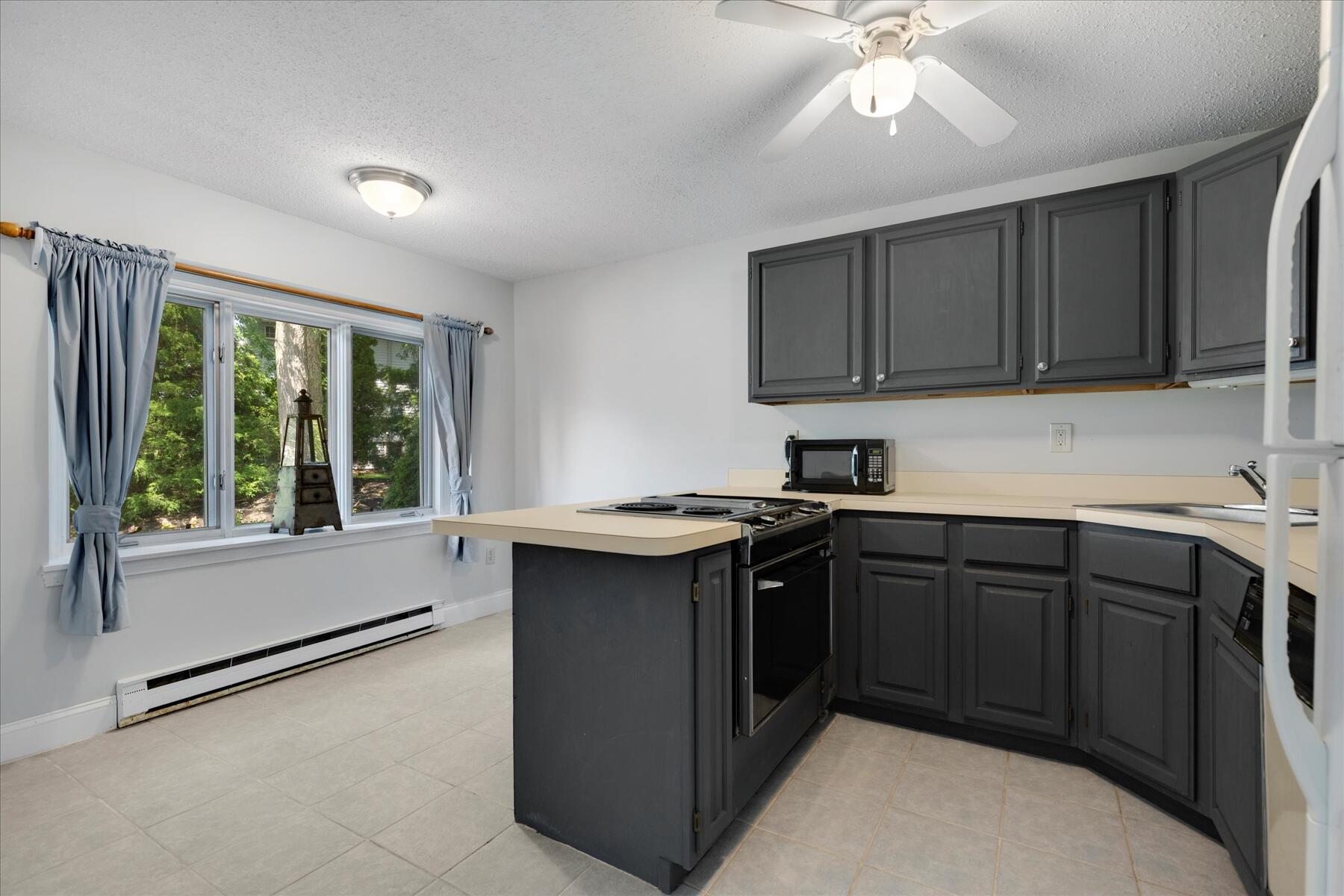 174 Lowell Road, Unit E51 Mashpee, MA 02649 - Photo 7 of 28 09-MG_3937-r