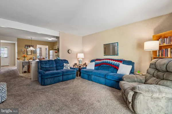 a living room with furniture and a couch