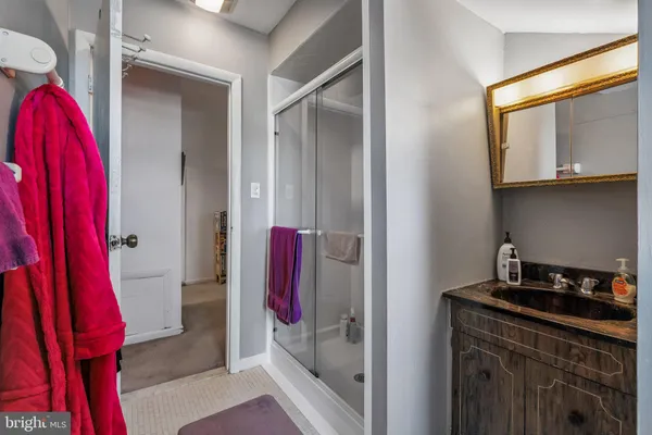 a view of a closet with storage