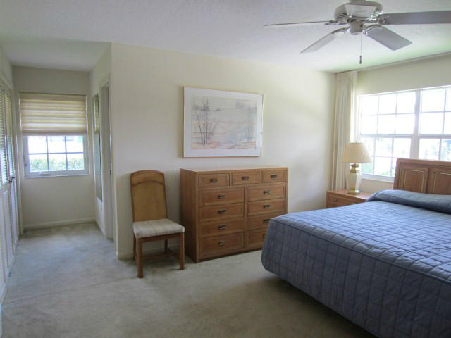 253 Puritan Road West Palm Beach, FL 33405 - Photo 20 of 43 MASTER BEDROOM W/VIEW TO MASTER BATH