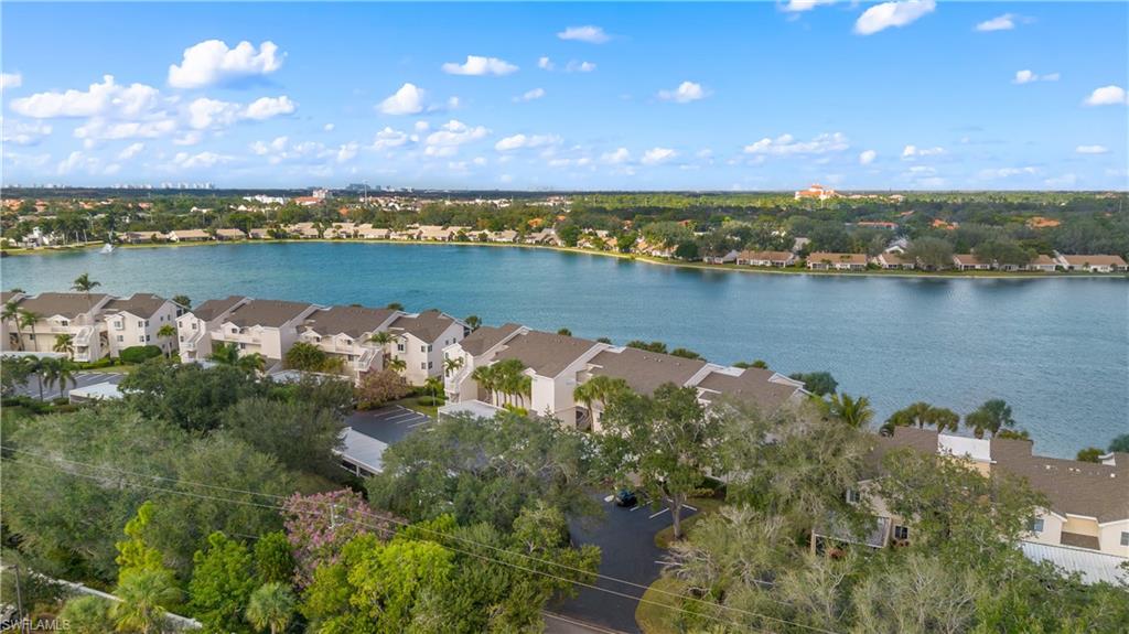 2711 Citrus Lake Drive, Unit F302 Naples, FL 34109 - Photo 14 of 20 a view of a lake with a city