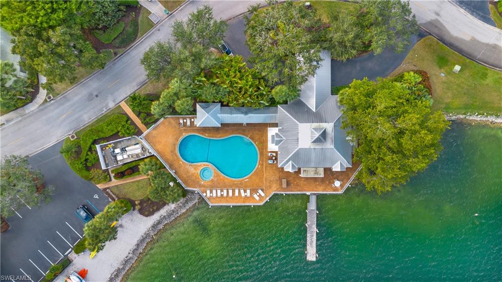 2711 Citrus Lake Drive, Unit F302 Naples, FL 34109 - Photo 16 of 20 aerial view of a house with garden space sitting space and swimming pool