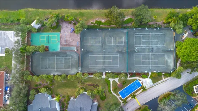 a small pool with outdoor seating area