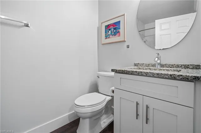 a bathroom with a toilet and a sink
