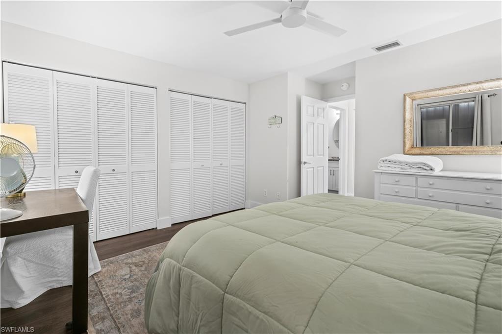 2711 Citrus Lake Drive, Unit F302 Naples, FL 34109 - Photo 10 of 20 a bedroom with a bed and a window