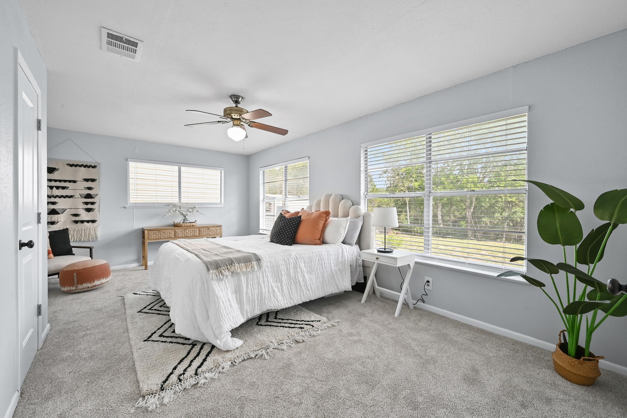 2018 Chaparral Park Road Manchaca, TX 78652 - Photo 12 of 26 a bed room with a bed and a chandelier
