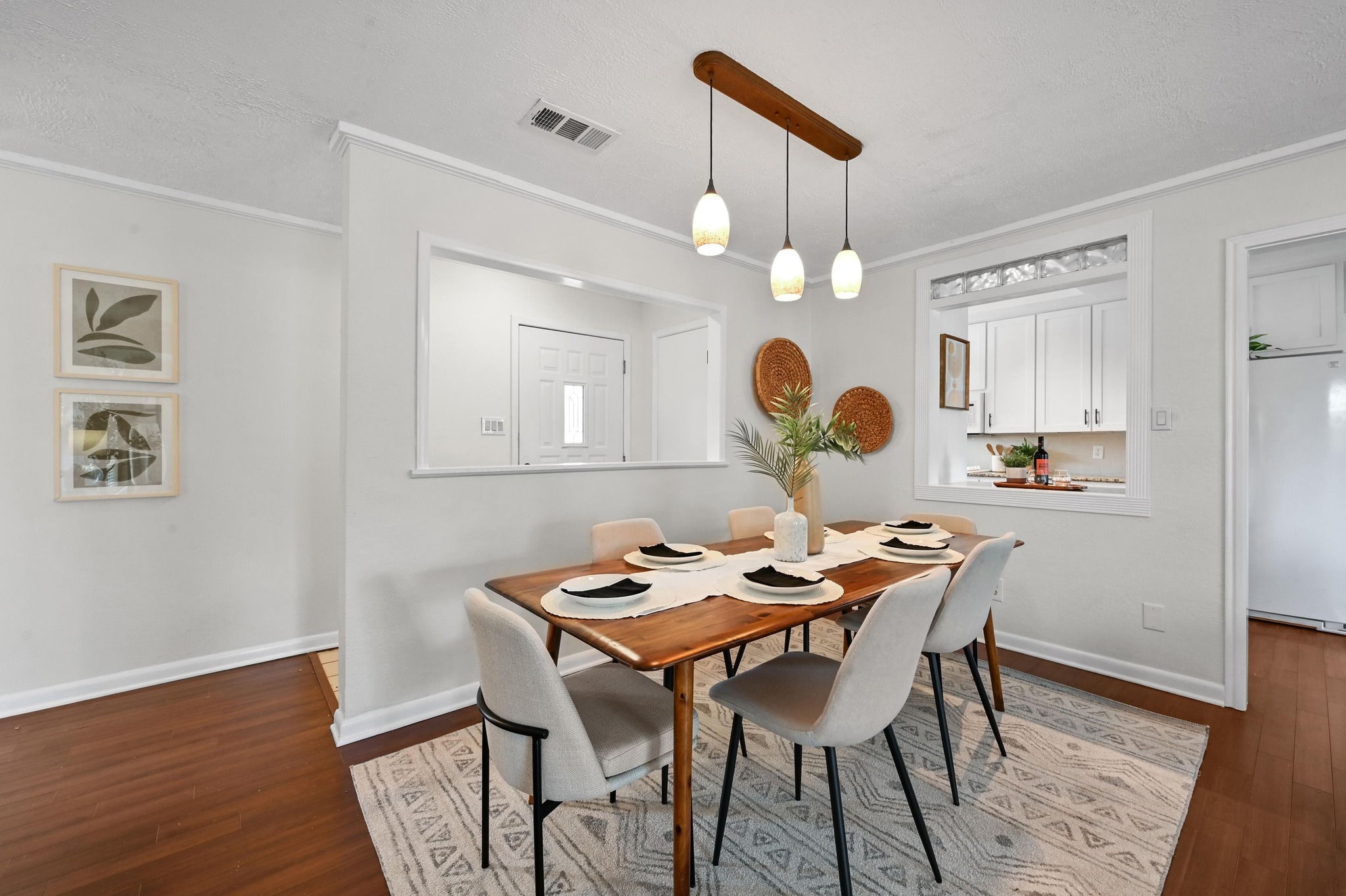 2018 Chaparral Park Road Manchaca, TX 78652 - Photo 4 of 26 a view of a dining room with furniture and wooden floor