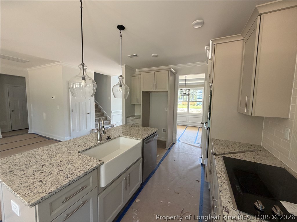 930 Rhum Drive Fayetteville, NC 28311 - Photo 21 of 49 a bathroom with a granite countertop sink and a mirror