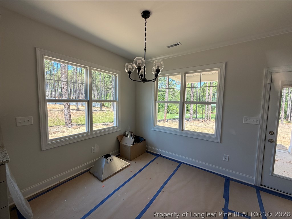 930 Rhum Drive Fayetteville, NC 28311 - Photo 23 of 49 a living room with furniture and a chandelier