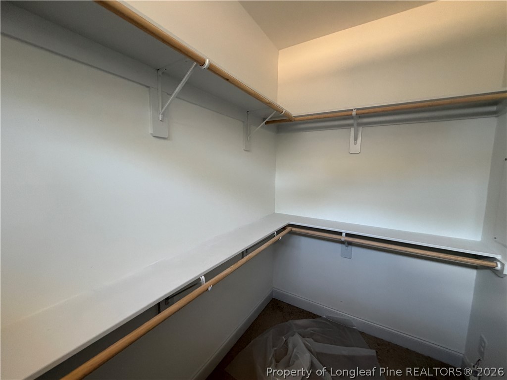 930 Rhum Drive Fayetteville, NC 28311 - Photo 30 of 49 a view of storage and utility room with racks on the wall
