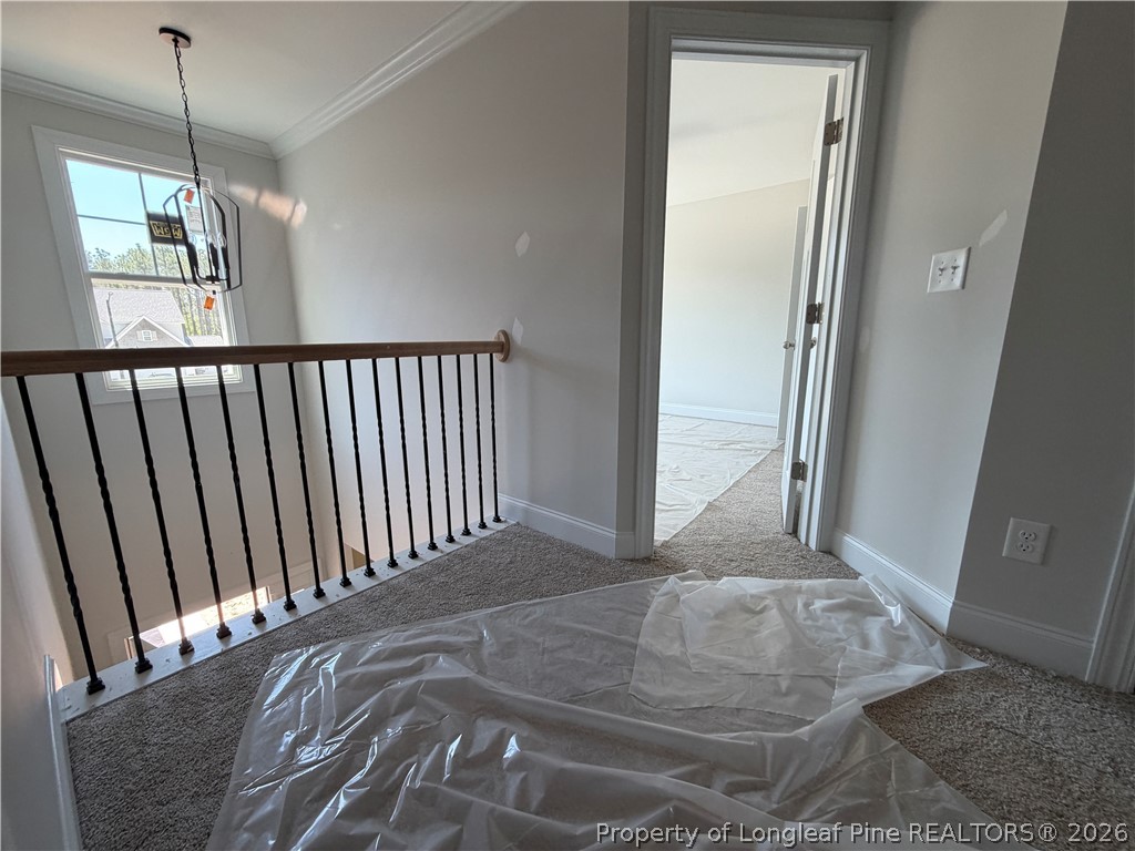930 Rhum Drive Fayetteville, NC 28311 - Photo 37 of 49 a view of a hallway to a bedroom and front door