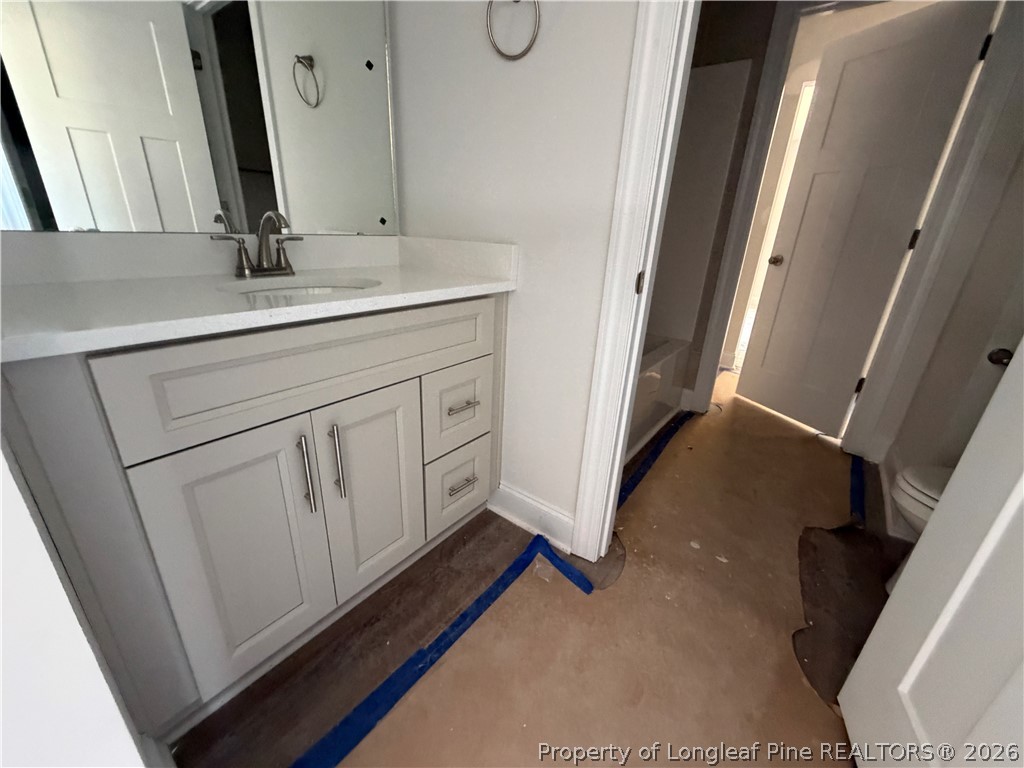 930 Rhum Drive Fayetteville, NC 28311 - Photo 42 of 49 a bathroom with a double vanity sink and mirror