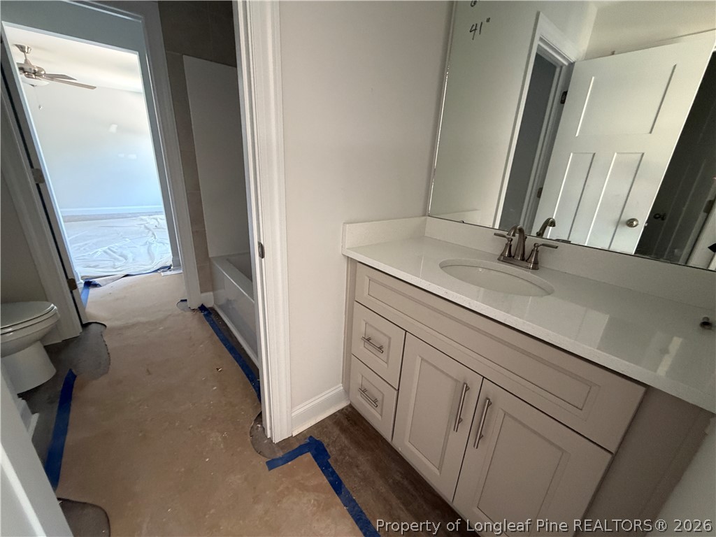 930 Rhum Drive Fayetteville, NC 28311 - Photo 44 of 49 a view of a bathroom with a sink and a mirror