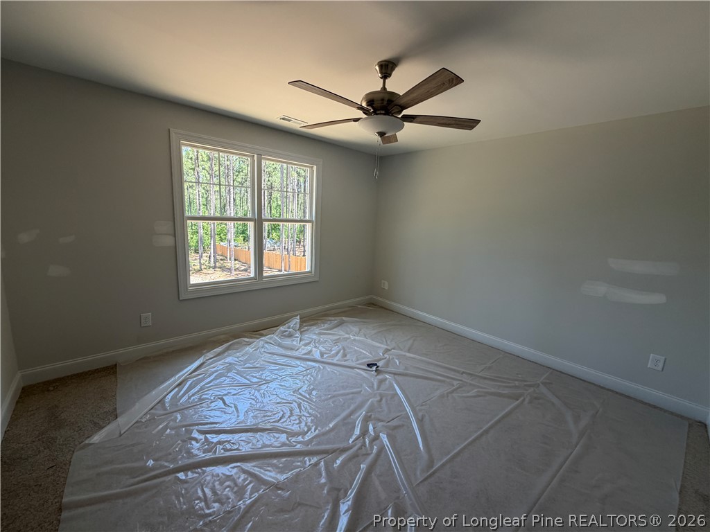 930 Rhum Drive Fayetteville, NC 28311 - Photo 45 of 49 an empty room with windows and fan
