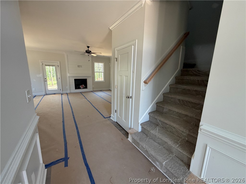 930 Rhum Drive Fayetteville, NC 28311 - Photo 10 of 49 a view of an entryway with wooden floor and a livingroom