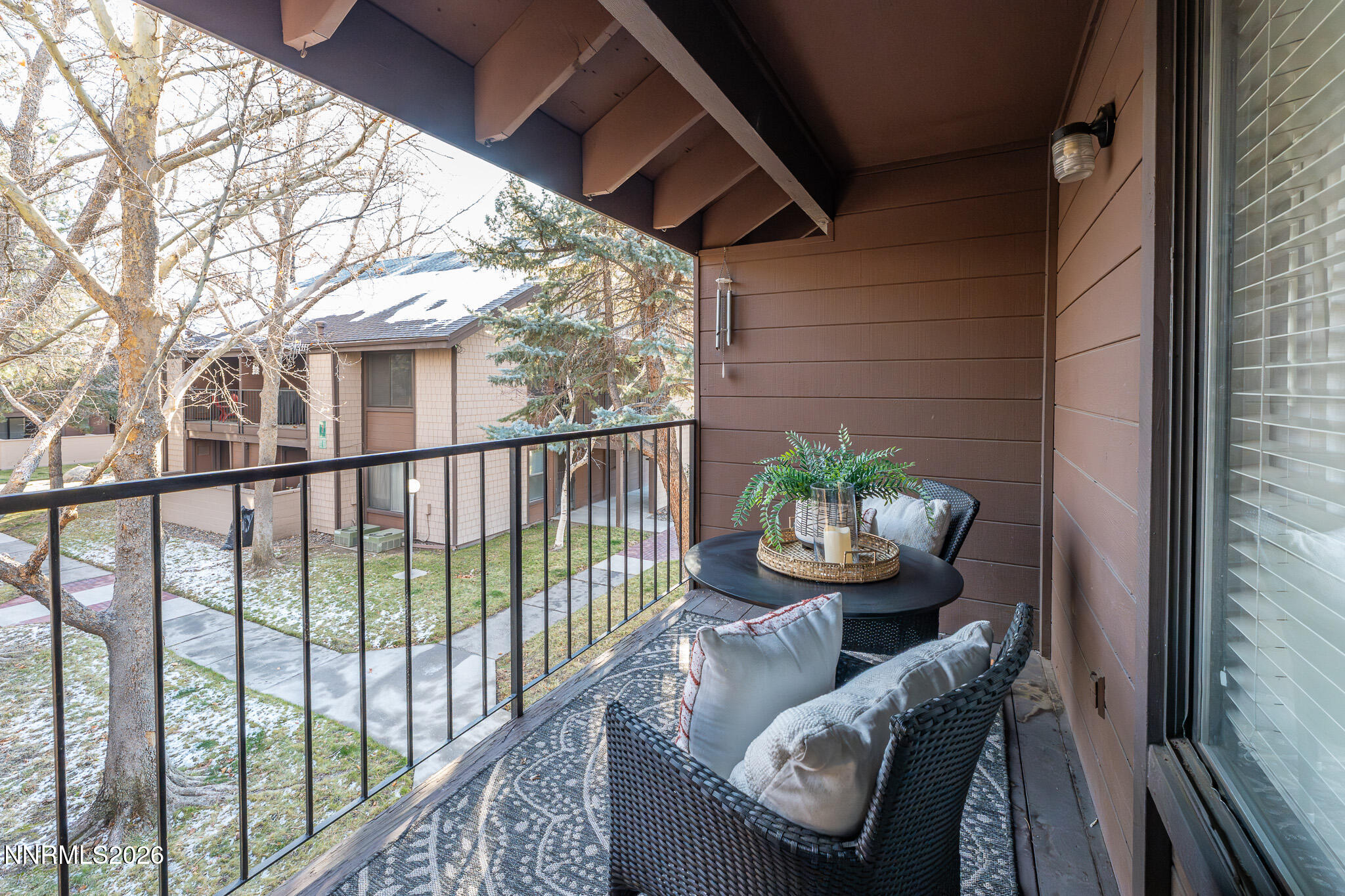 1465 East Peckham Lane, Unit 6 Reno, NV 89502 - Photo 18 of 25 a outdoor living room with furniture