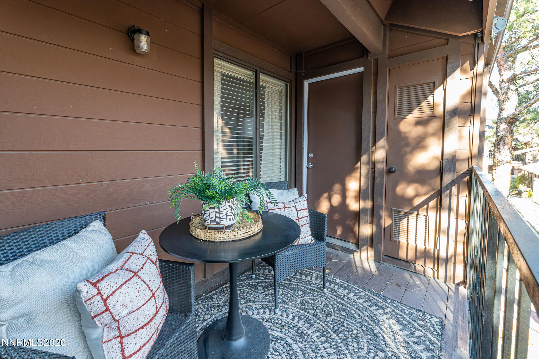 1465 East Peckham Lane, Unit 6 Reno, NV 89502 - Photo 19 of 25 a view of a house with backyard and wooden floor