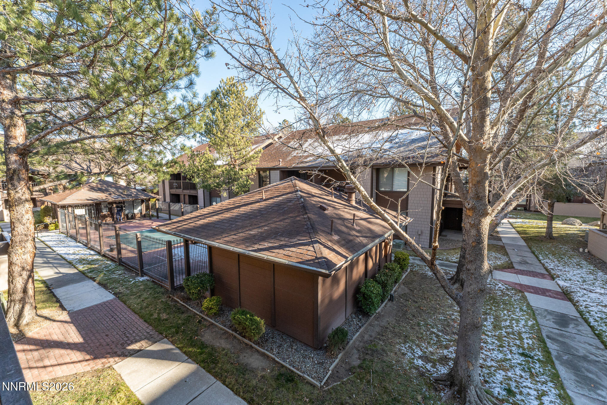 1465 East Peckham Lane, Unit 6 Reno, NV 89502 - Photo 20 of 25 a view of a house with a yard