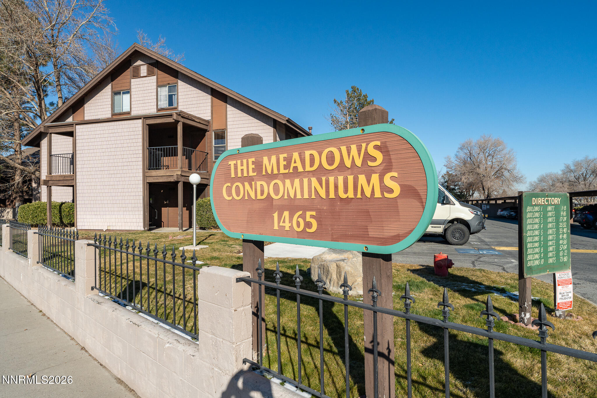 1465 East Peckham Lane, Unit 6 Reno, NV 89502 - Photo 25 of 25 a sign on the street of a building