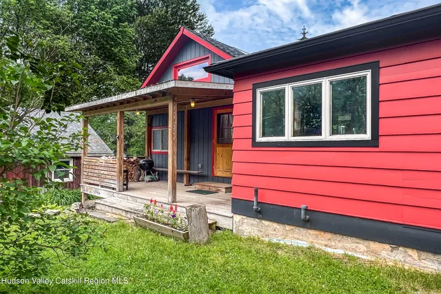 a front view of a house with porch