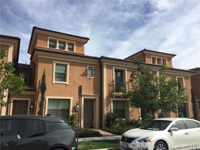 206 Rodeo Irvine, CA 92602 - Photo 1 of 1 a front view of a house with a yard