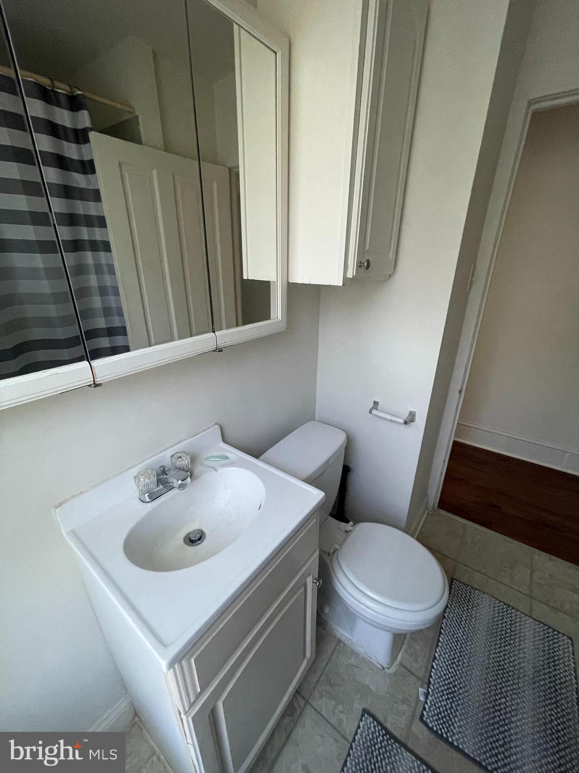 13 Kirkwood Road, Unit 2B Gibbsboro, NJ 08026 - Photo 5 of 9 a white toilet sitting next to a bathroom sink