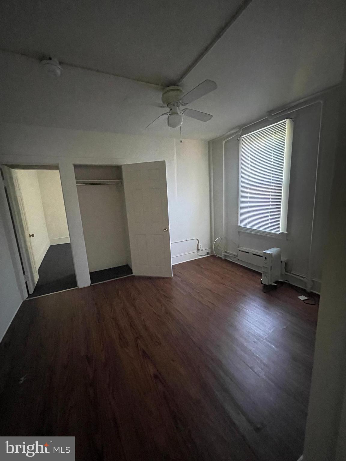 13 Kirkwood Road, Unit 2B Gibbsboro, NJ 08026 - Photo 6 of 9 a view of a livingroom with wooden floor and window
