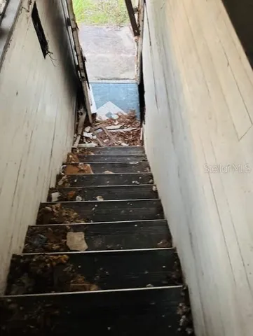 a view of a swimming pool in the backyard