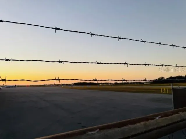a view of a ocean next to a beach