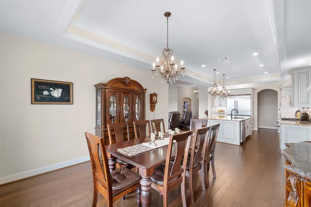 a view of a hallway view with wooden floor and staircase