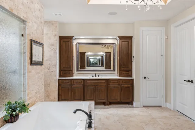 a workspace with wooden floor and a window
