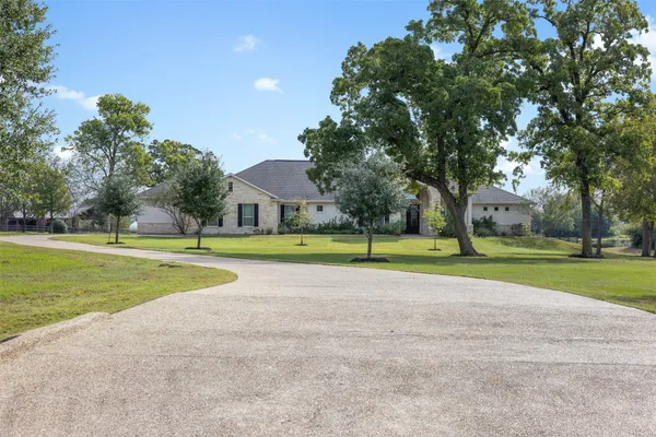 a view of a house with a swimming pool