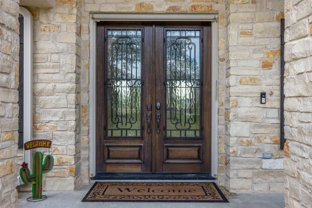 a view of an entryway with a front door
