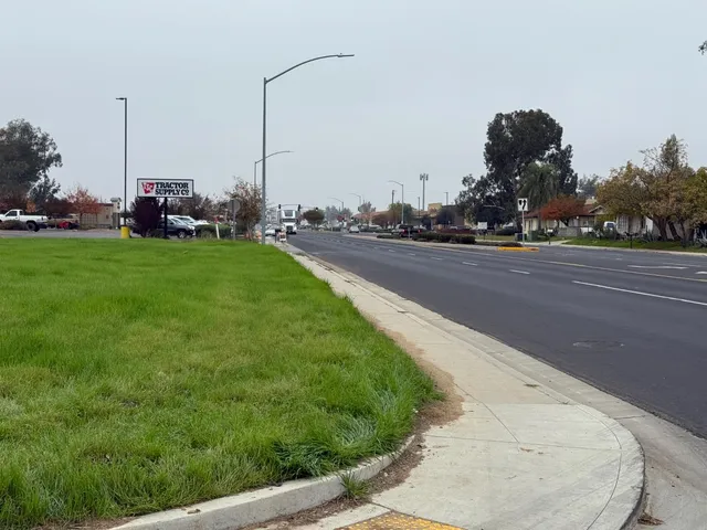 a view of a playground with houses