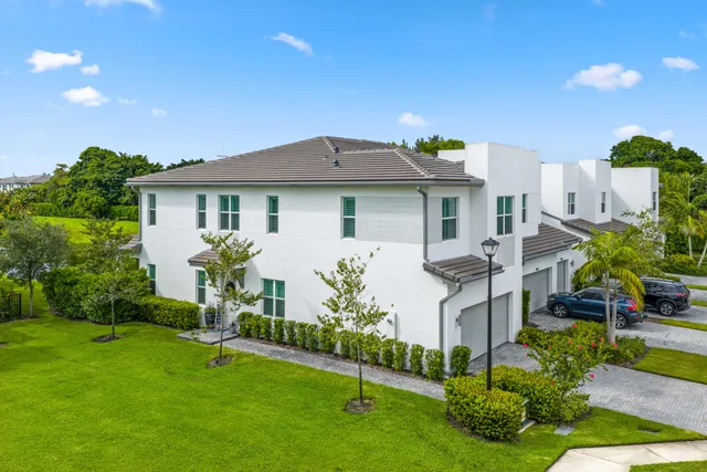 a view of a livingroom with furniture and a window