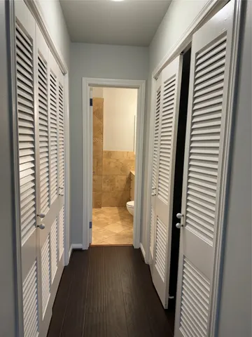 a view of a room with a large window