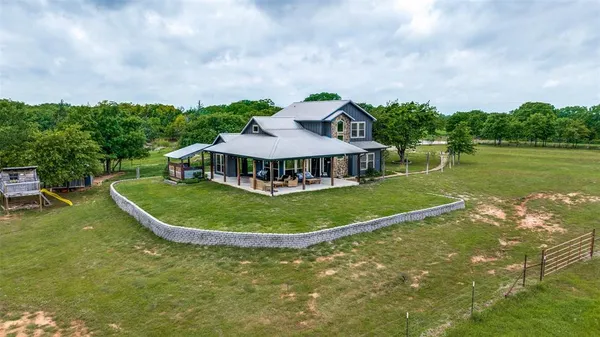 $825,000 | 1458 Jim Harry Loop, Sunset, TX 76270