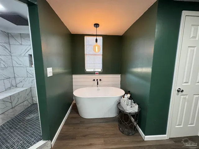 a bathroom with a sink and mirror