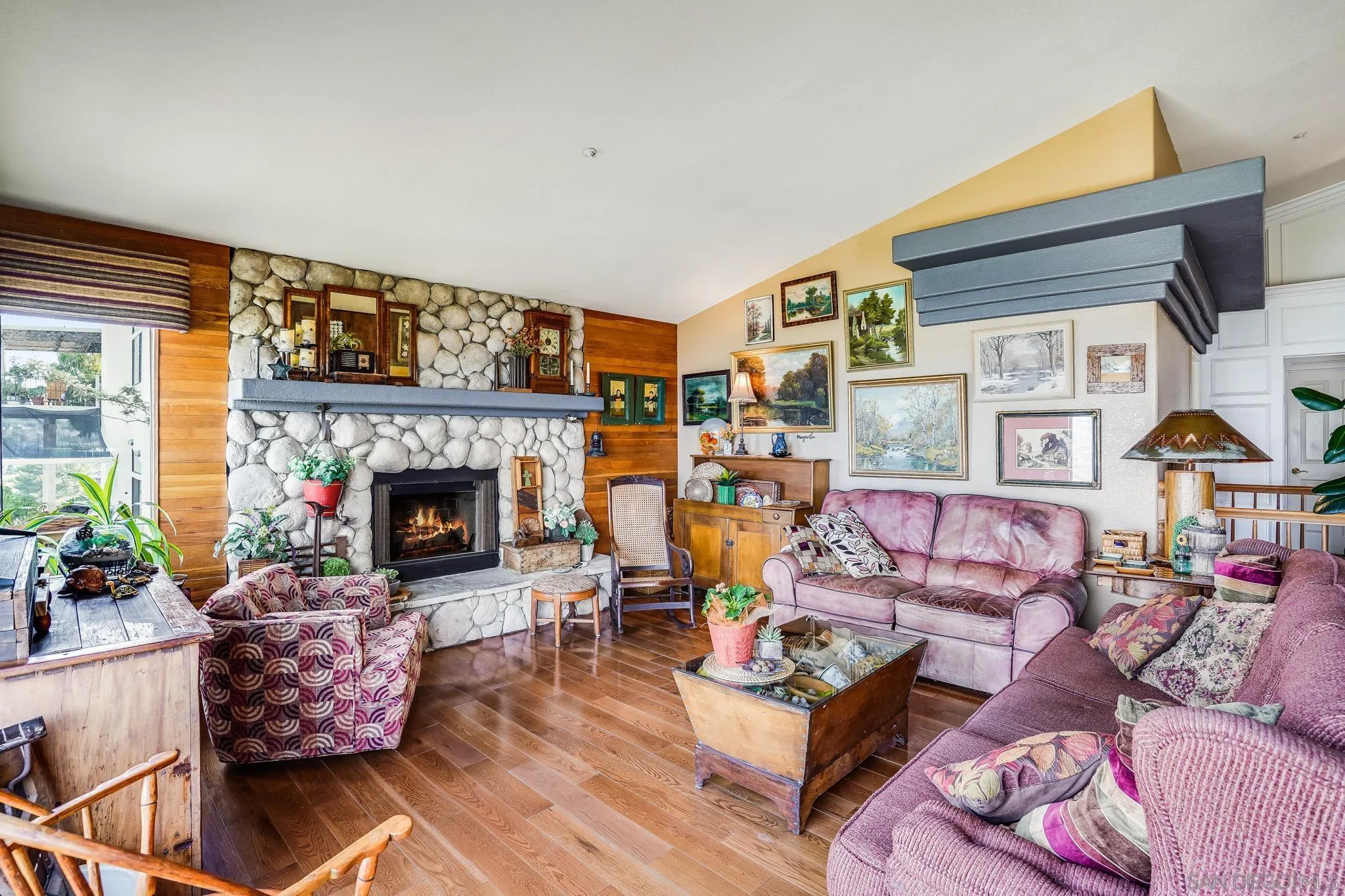 2366 Highview Lane Spring Valley, CA 91977 - Photo 12 of 53 a living room with furniture and a fireplace