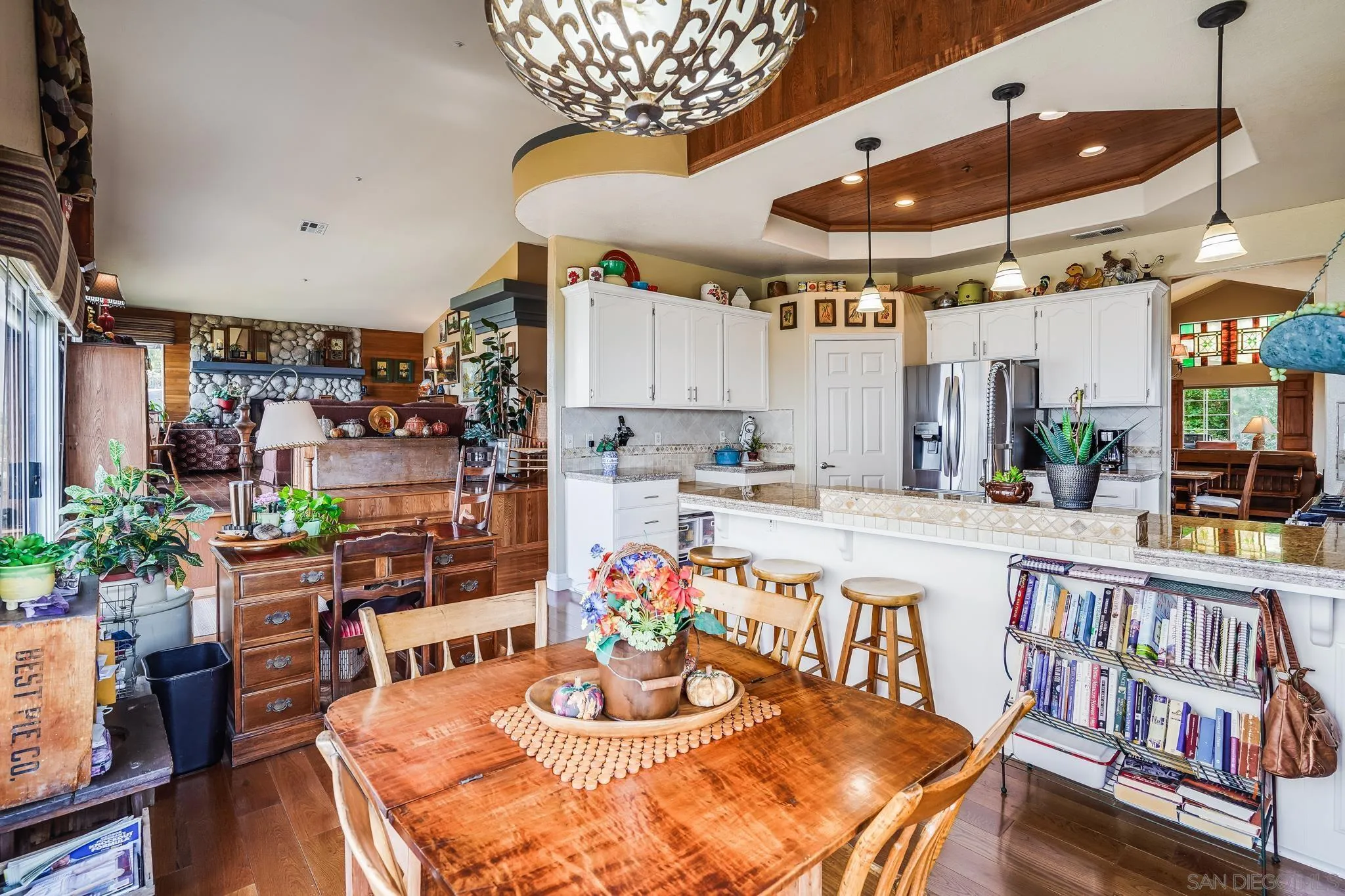 2366 Highview Lane Spring Valley, CA 91977 - Photo 15 of 53 a dining room with lots of wooden furniture