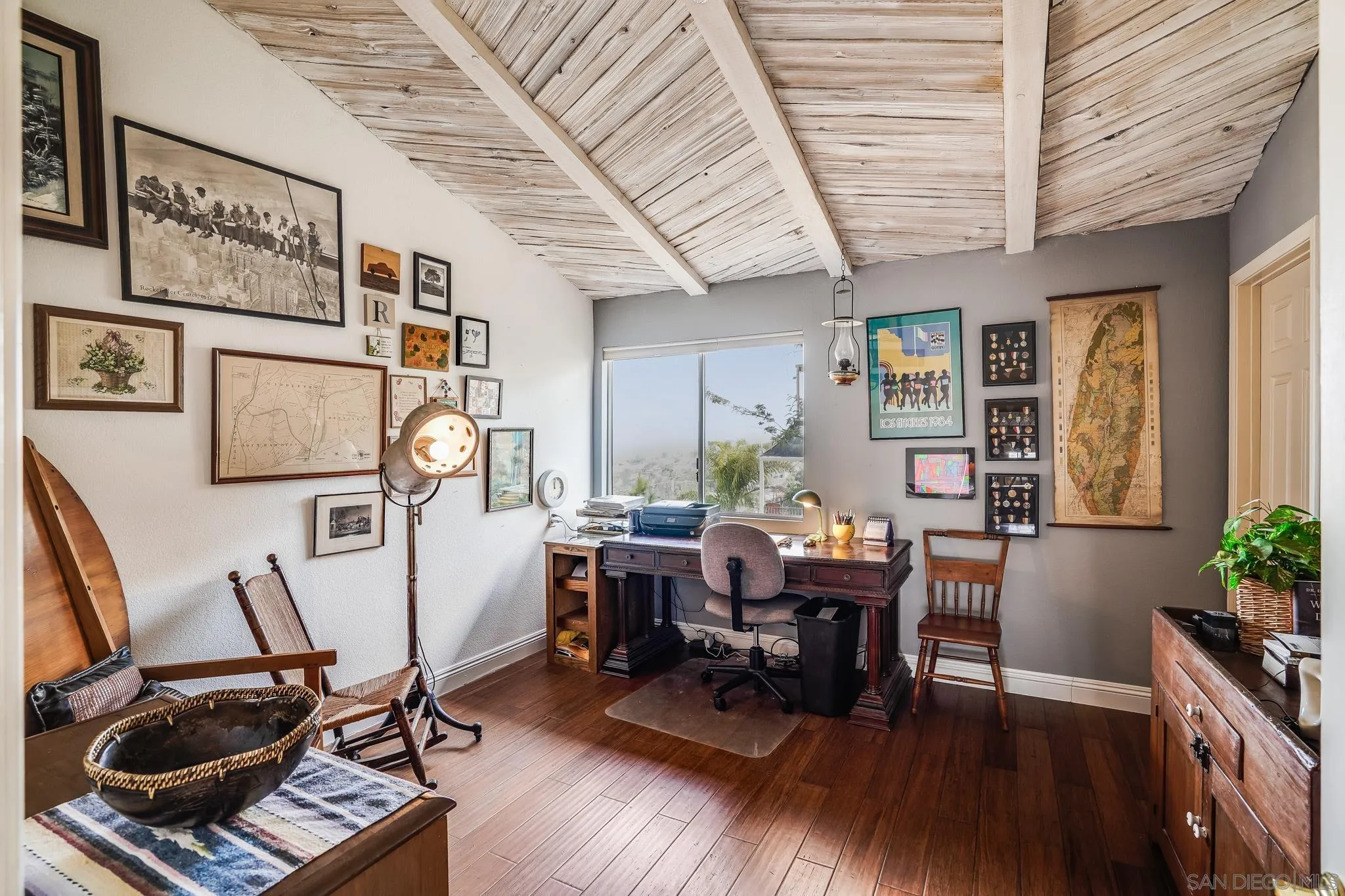 2366 Highview Lane Spring Valley, CA 91977 - Photo 20 of 53 a view of a workspace with furniture and a potted plant