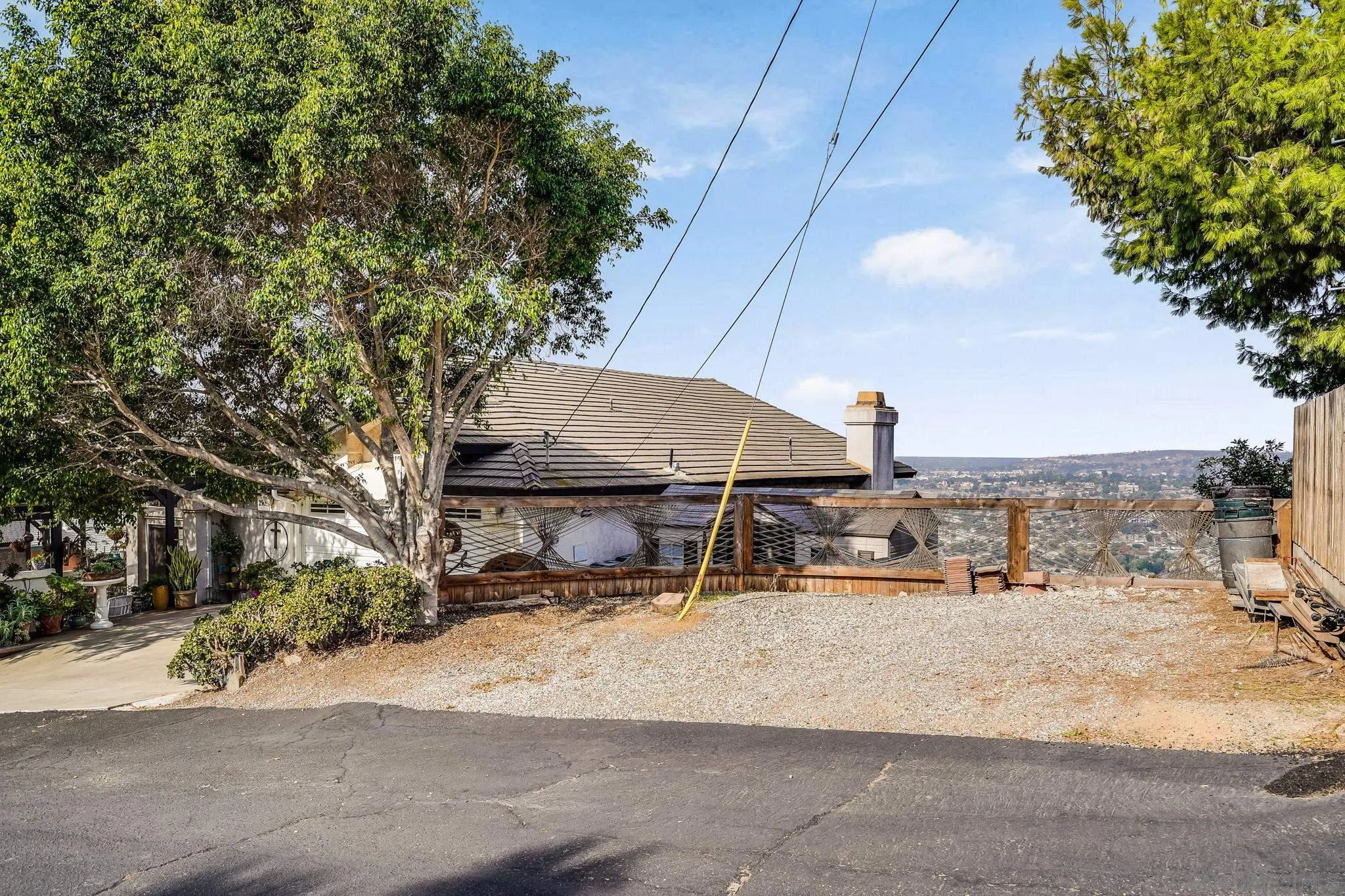 2366 Highview Lane Spring Valley, CA 91977 - Photo 2 of 53 a view of a house with snow on the road