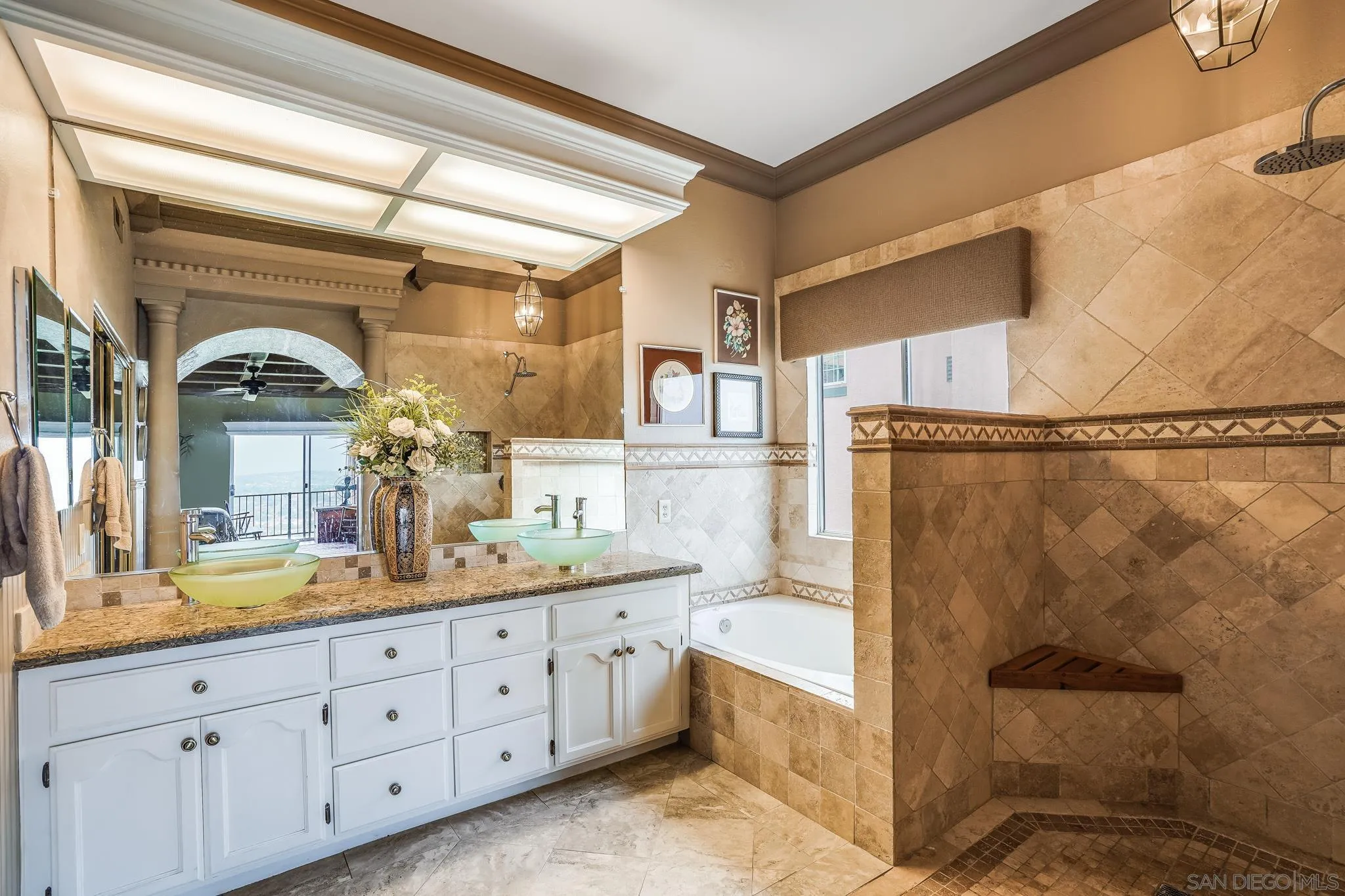 2366 Highview Lane Spring Valley, CA 91977 - Photo 29 of 53 a bathroom with a granite countertop sink a mirror and a shower