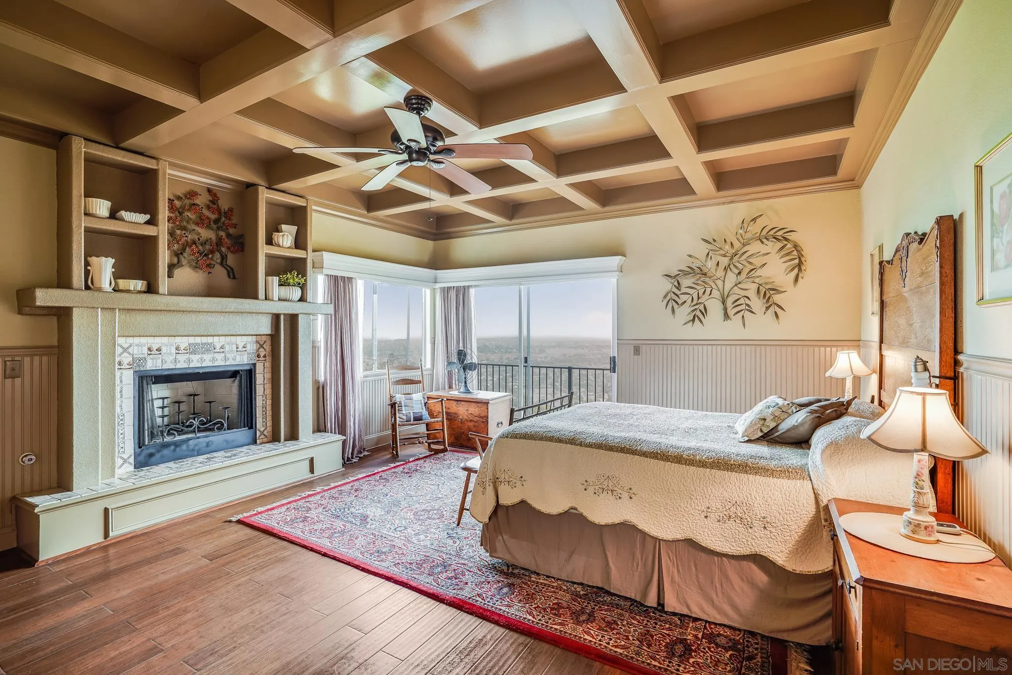 2366 Highview Lane Spring Valley, CA 91977 - Photo 32 of 53 a bedroom with a bed and a fireplace