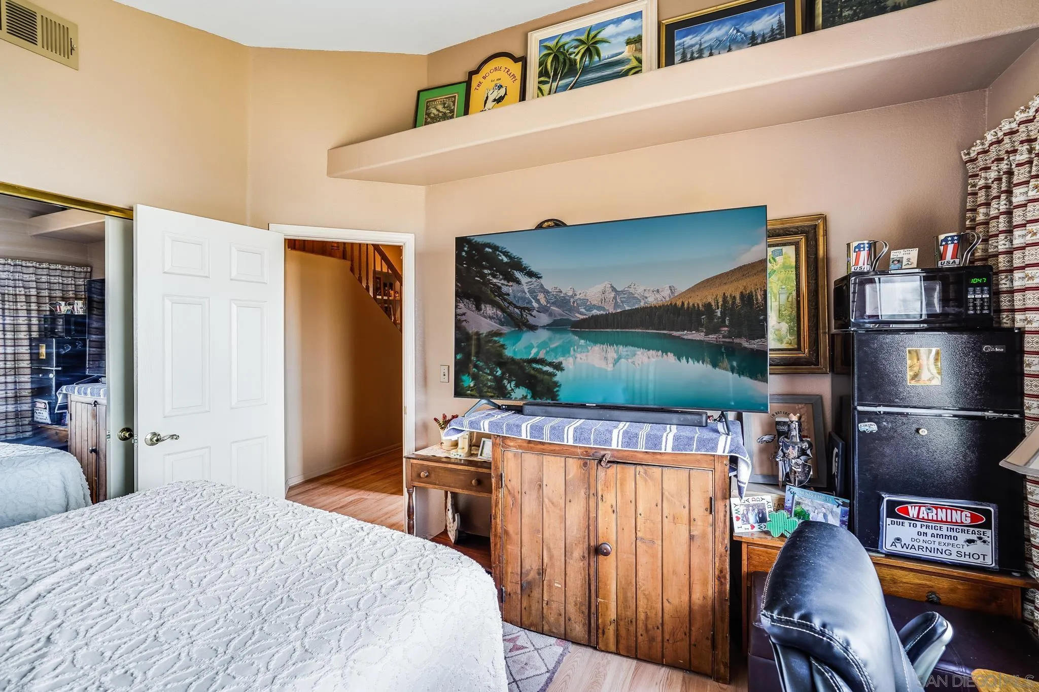 2366 Highview Lane Spring Valley, CA 91977 - Photo 34 of 53 a bed room with a bed and a television