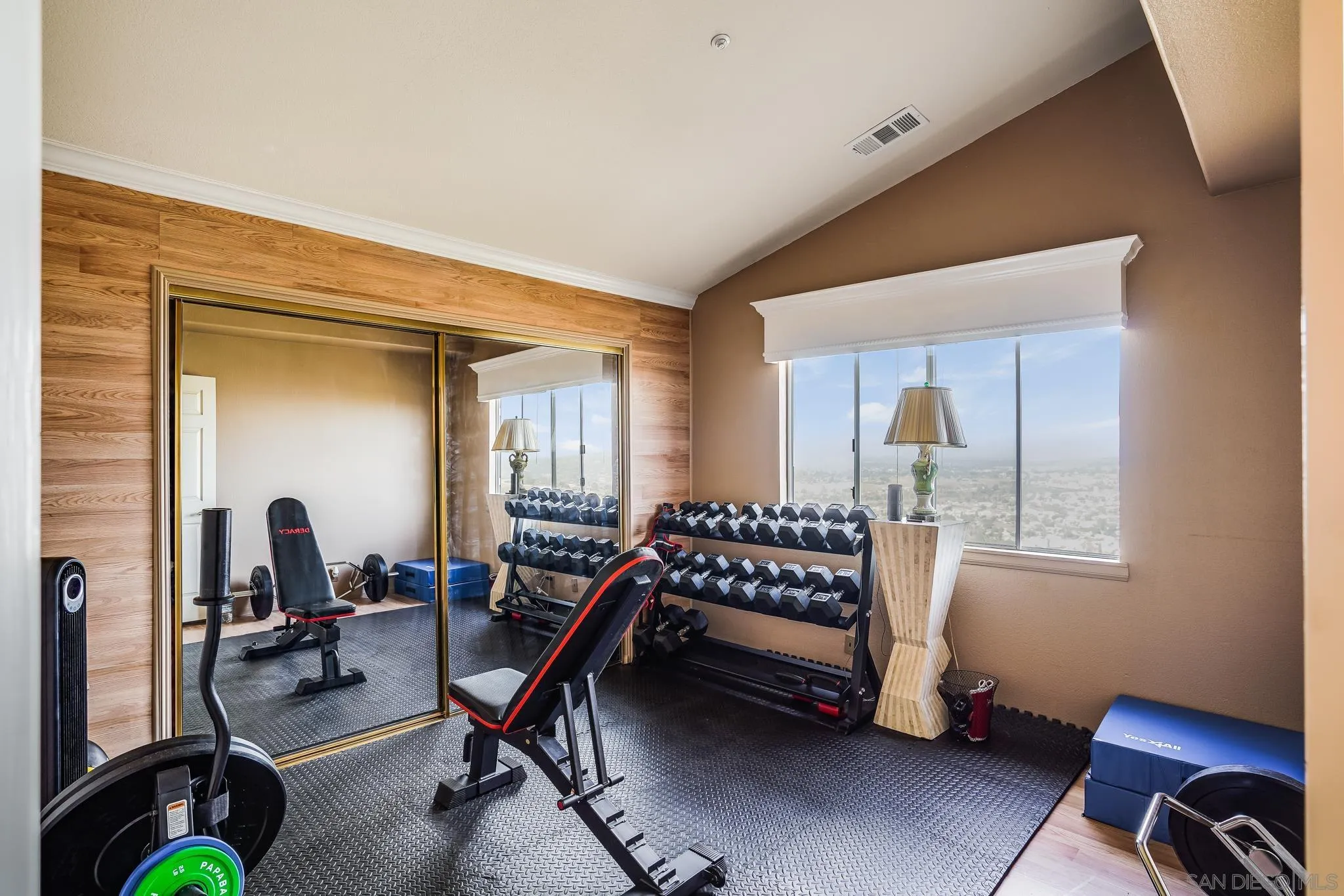 2366 Highview Lane Spring Valley, CA 91977 - Photo 36 of 53 a living room with furniture gym equipment and a window