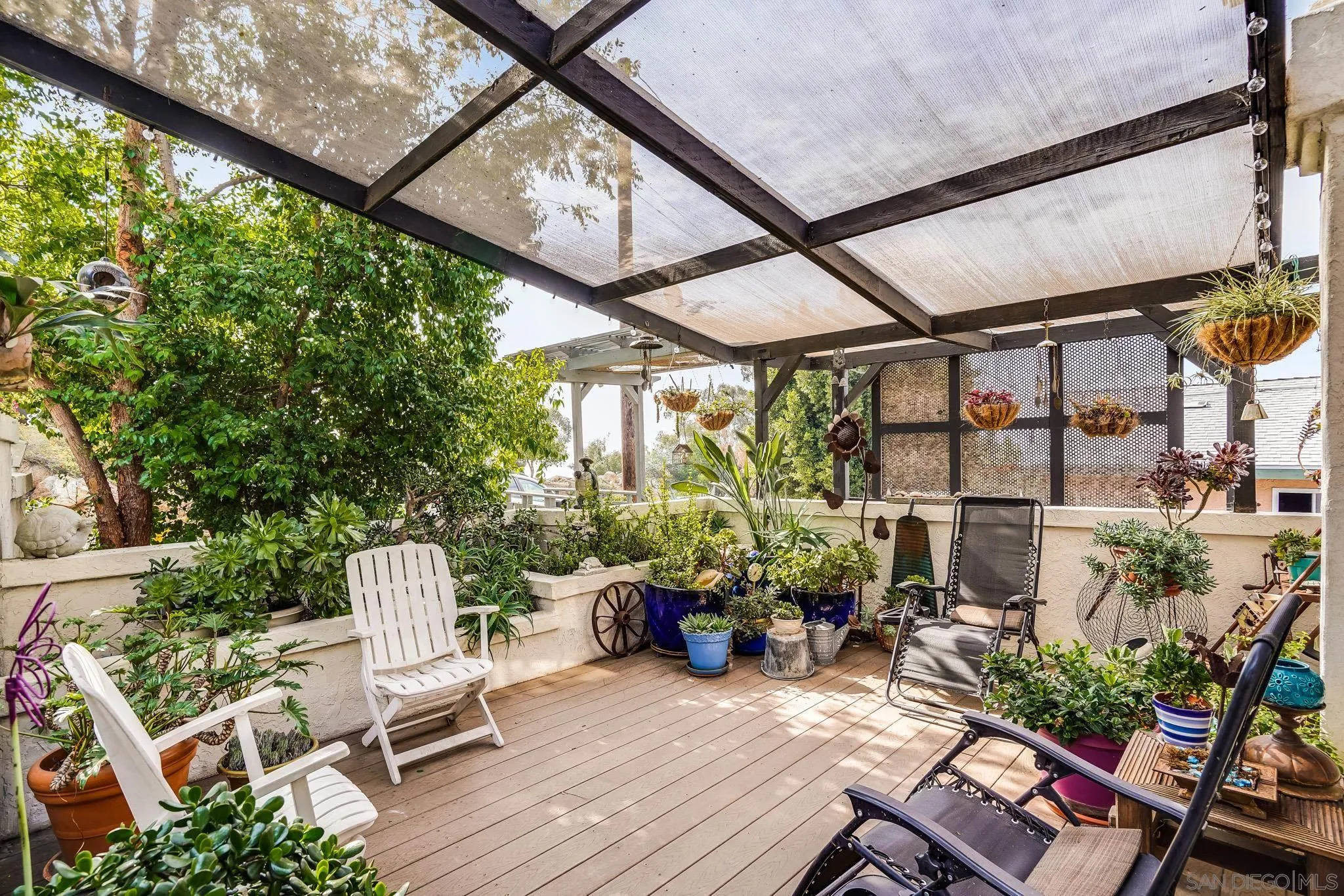 2366 Highview Lane Spring Valley, CA 91977 - Photo 5 of 53 a view of chair and tables in the patio