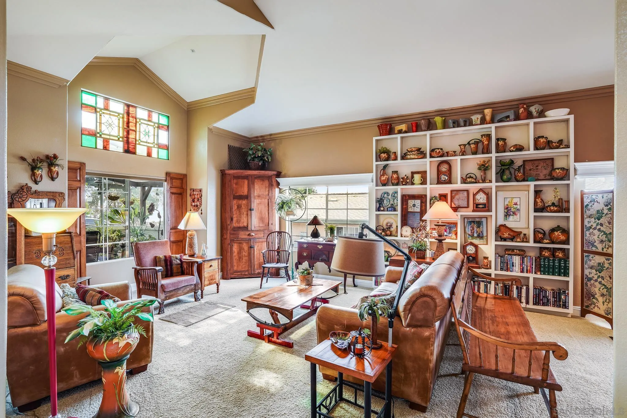 2366 Highview Lane Spring Valley, CA 91977 - Photo 7 of 53 a living room with furniture a lamp and a potted plant