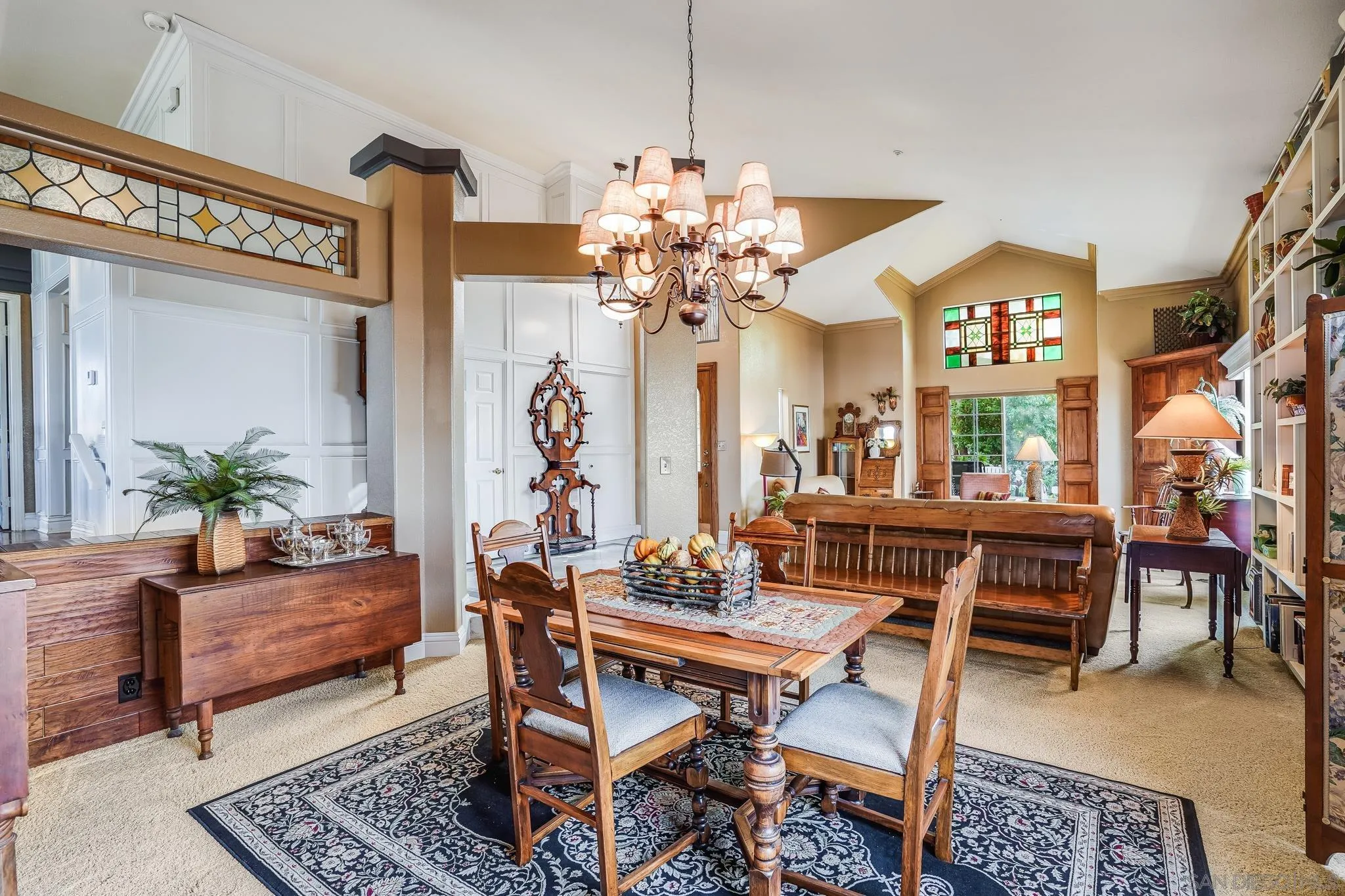 2366 Highview Lane Spring Valley, CA 91977 - Photo 9 of 53 a view of a dining room with furniture and a chandelier