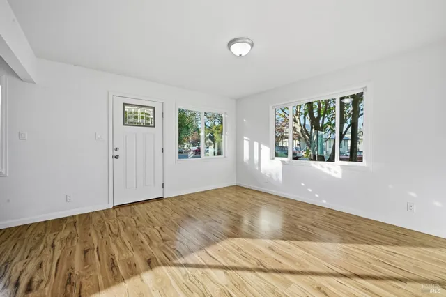 a view of empty room with front door